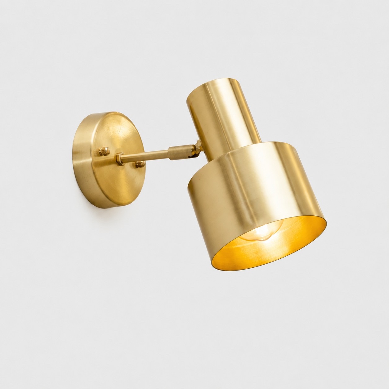 Angled adjustable arm brass wall sconce SKU image